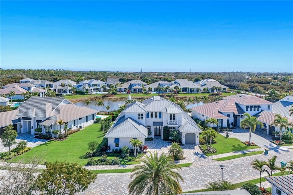 Aerial view of residential area with a large body of water