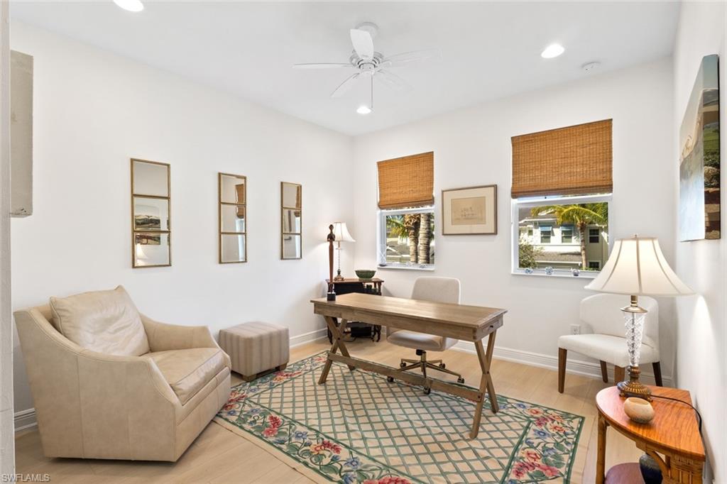 Home office with light wood-style flooring, recessed lighting, and ceiling fan
