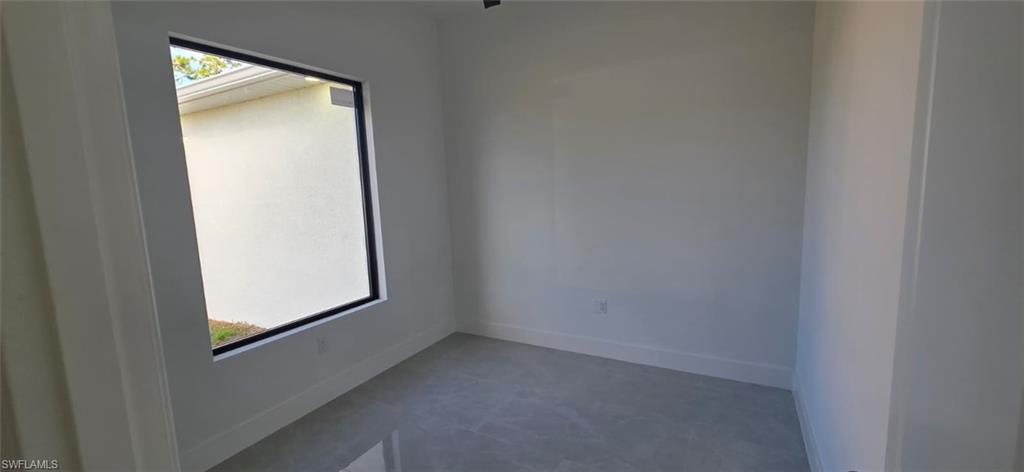 Spare room with baseboards