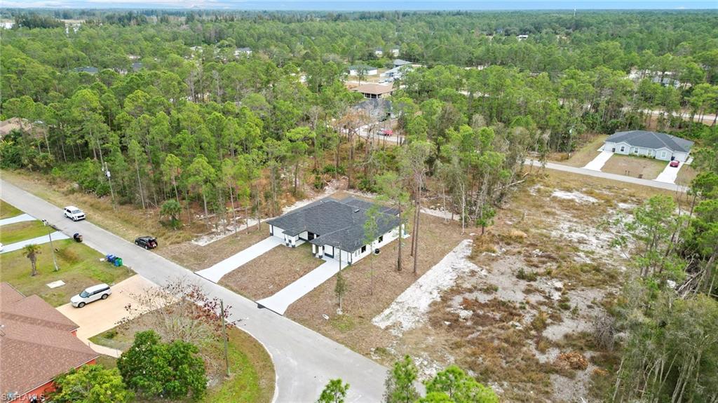 Drone / aerial view of a heavily wooded area