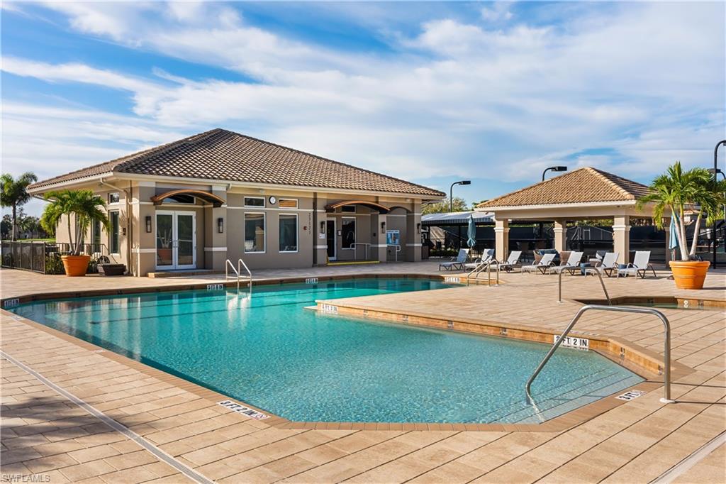Community pool featuring a patio and a gazebo