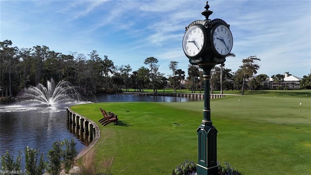 View of property's community featuring a water view and golf course view