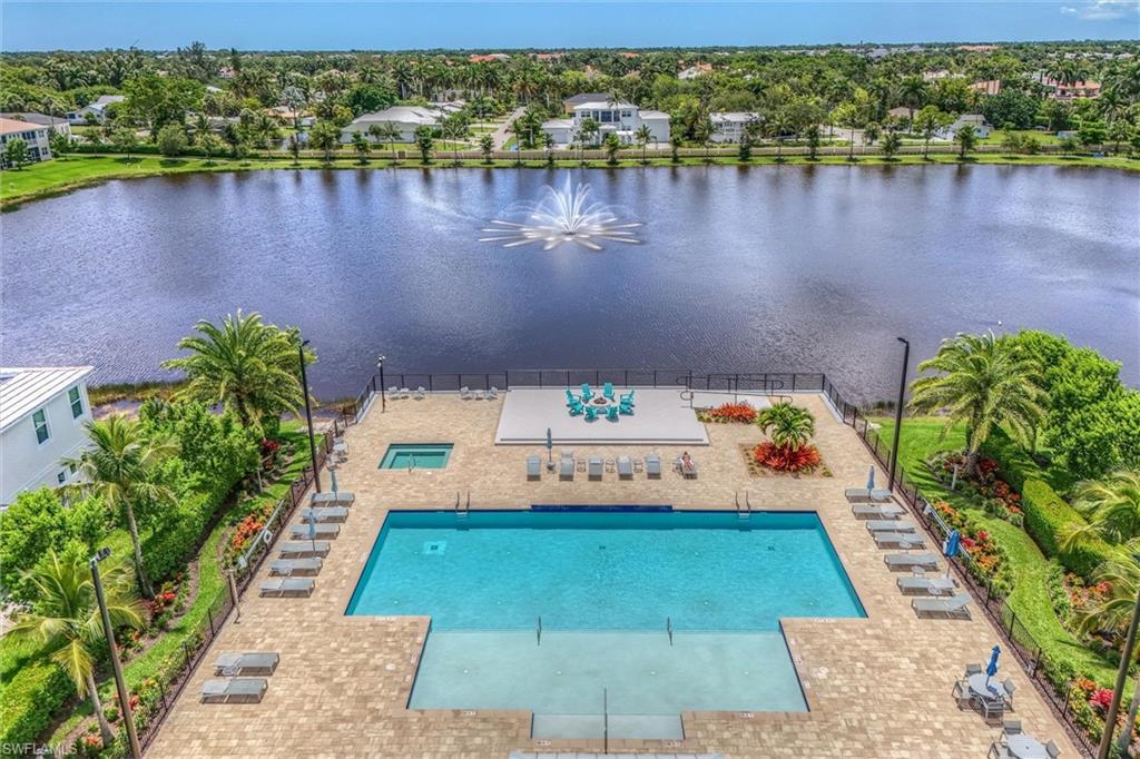 Community pool with a water view