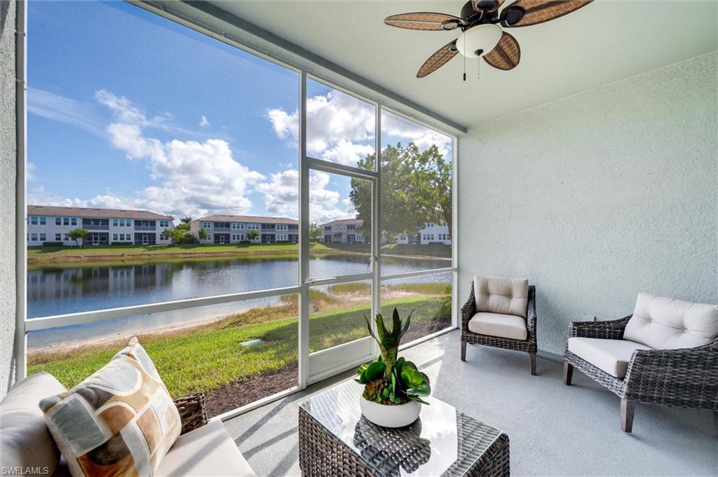 Lanai featuring an outdoor hangout area, a ceiling fan, and a water view