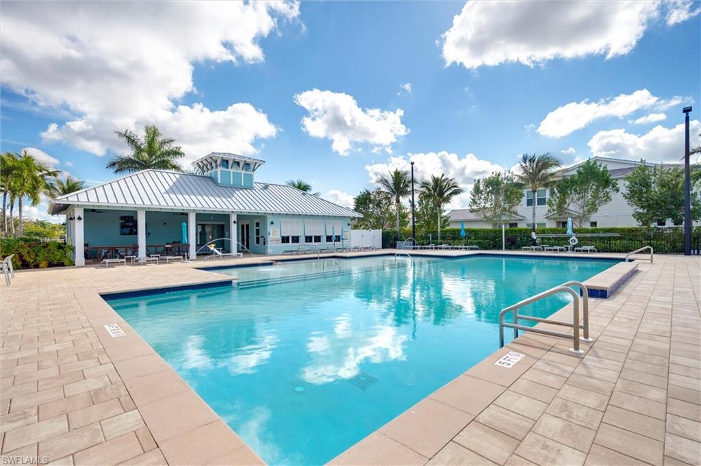 Community pool featuring a patio area