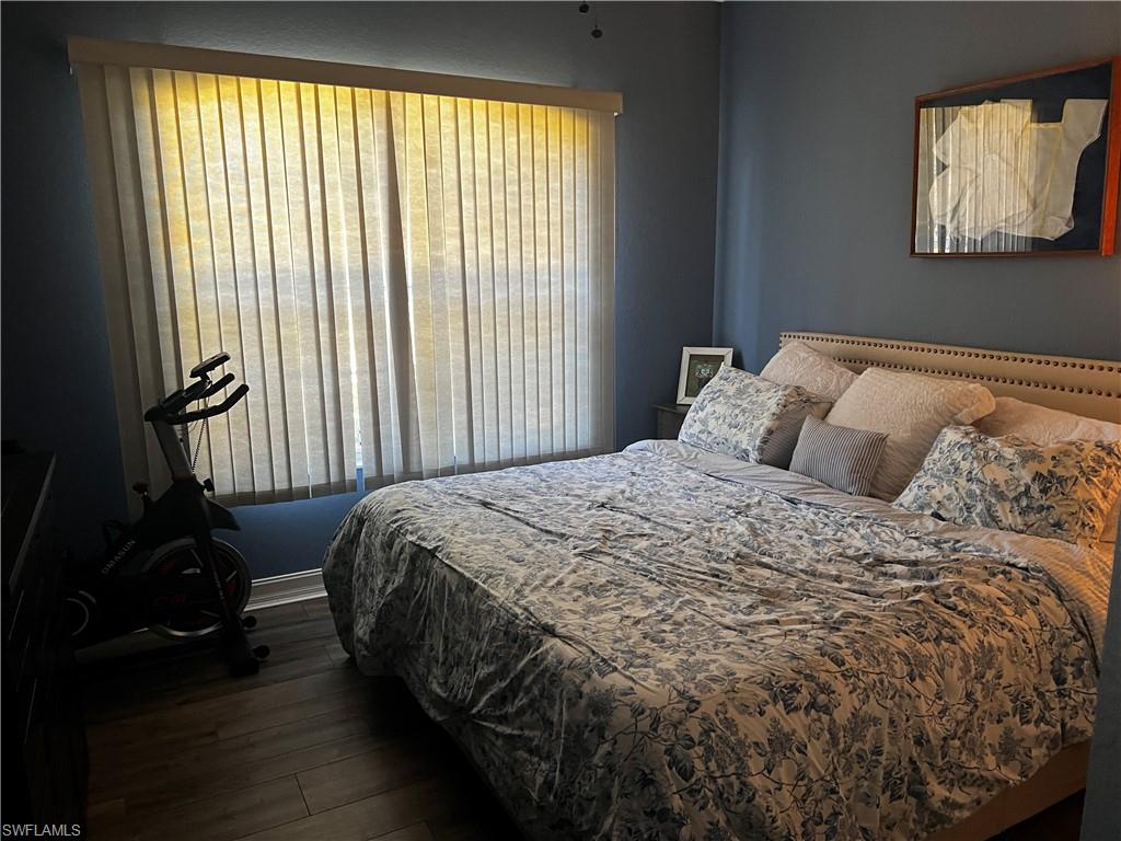 Bedroom with wood finished floors