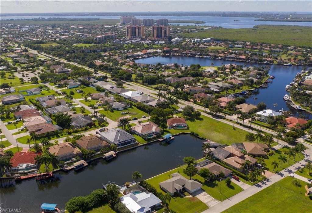 Aerial view of the beautiful three car, two ensuite plus property 1/2 block off Cape Harbour's El Dorado Blvd toward SE