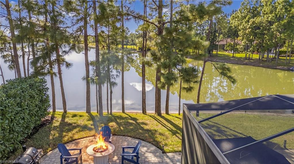 Water view with a fire pit