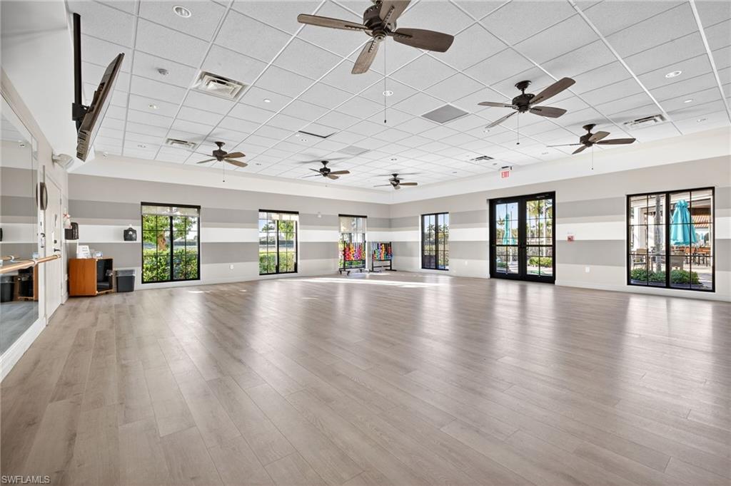 Workout area with a paneled ceiling