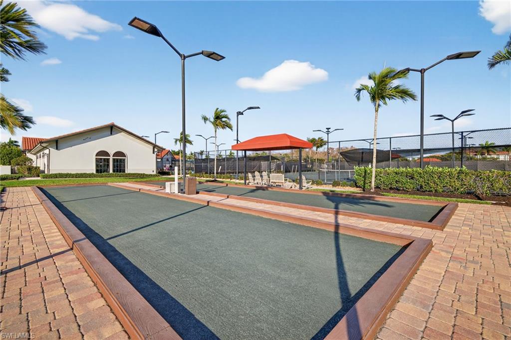 View of property's community with a bocce ball area
