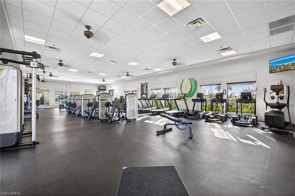 Workout area with a paneled ceiling