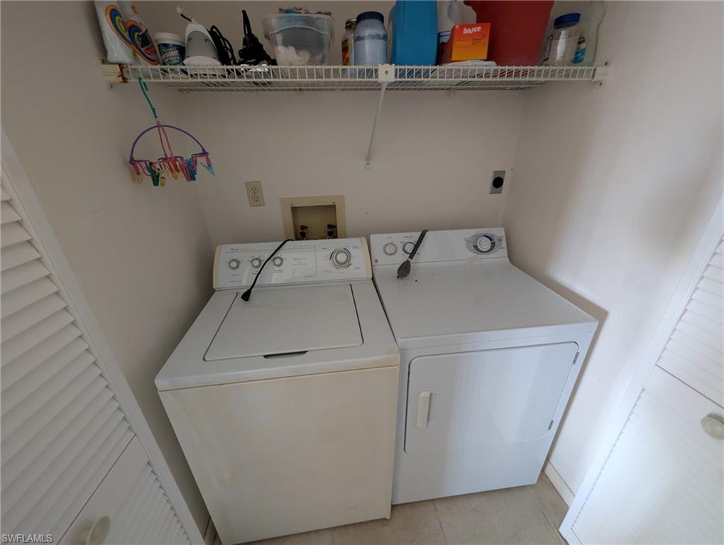 Laundry area featuring independent washer and dryer