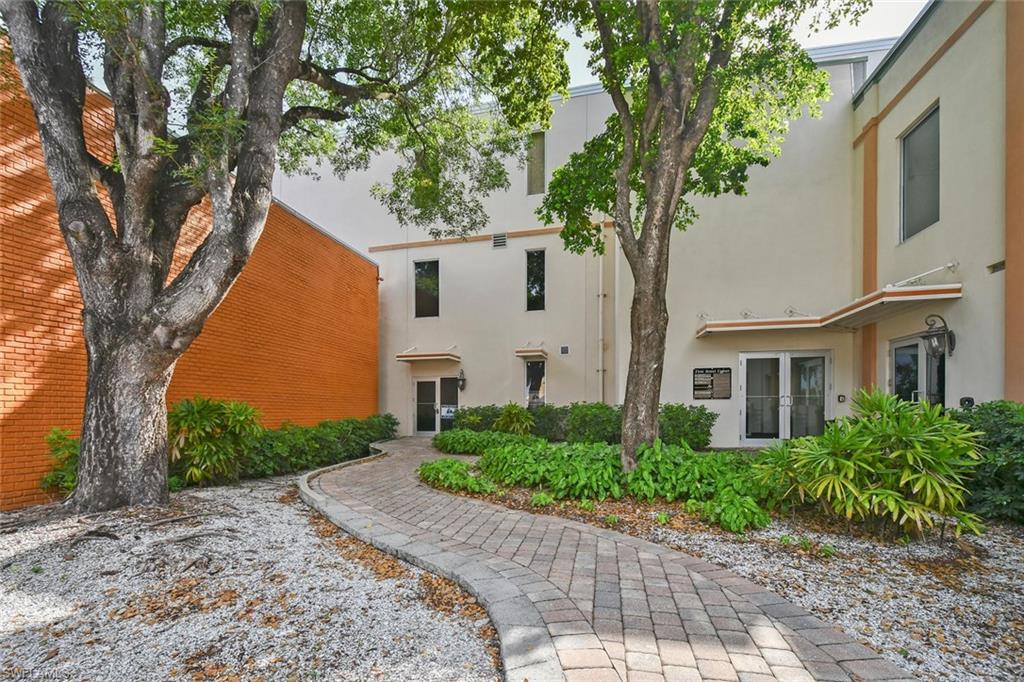 Back of property with stucco siding