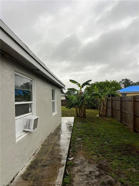 View of fenced backyard
