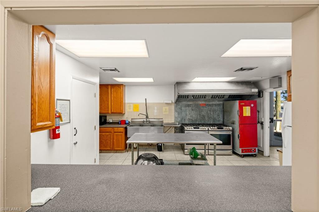 Serving window at well-appointed commercial kitchen