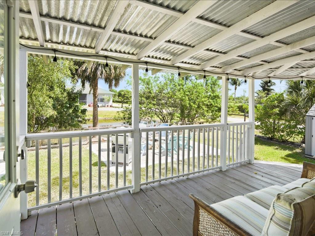 Wooden terrace with a lawn