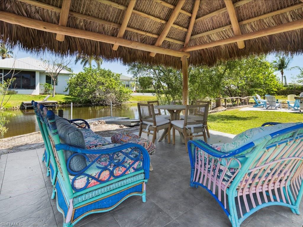 View of patio with a water view