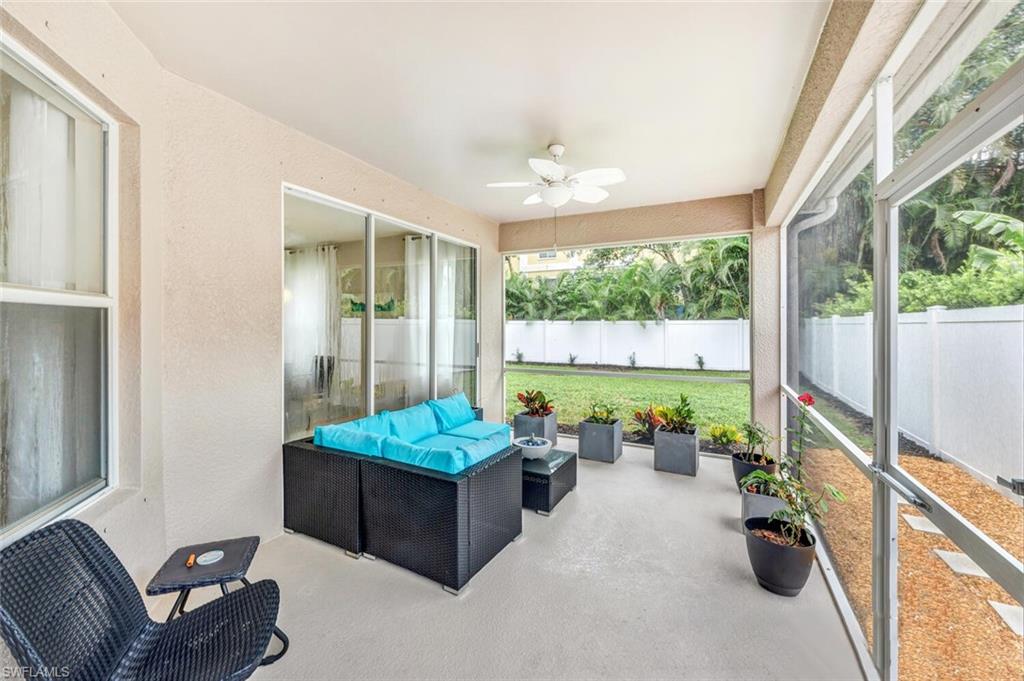 Sunroom / solarium featuring an outdoor hangout area and a ceiling fan