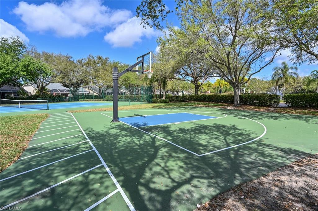 View of sport court with community basketball court and a tennis court