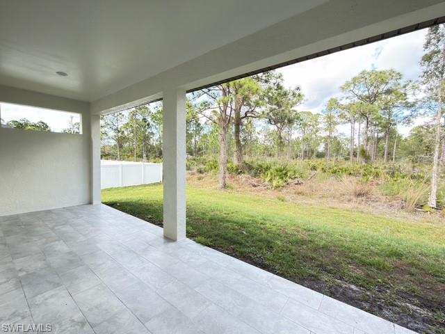 View of yard with a patio