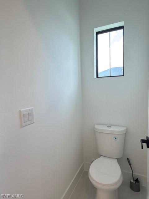 Full bath with a tile shower