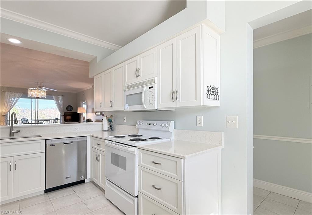 Whit shaker cabinets and quartz counter tops