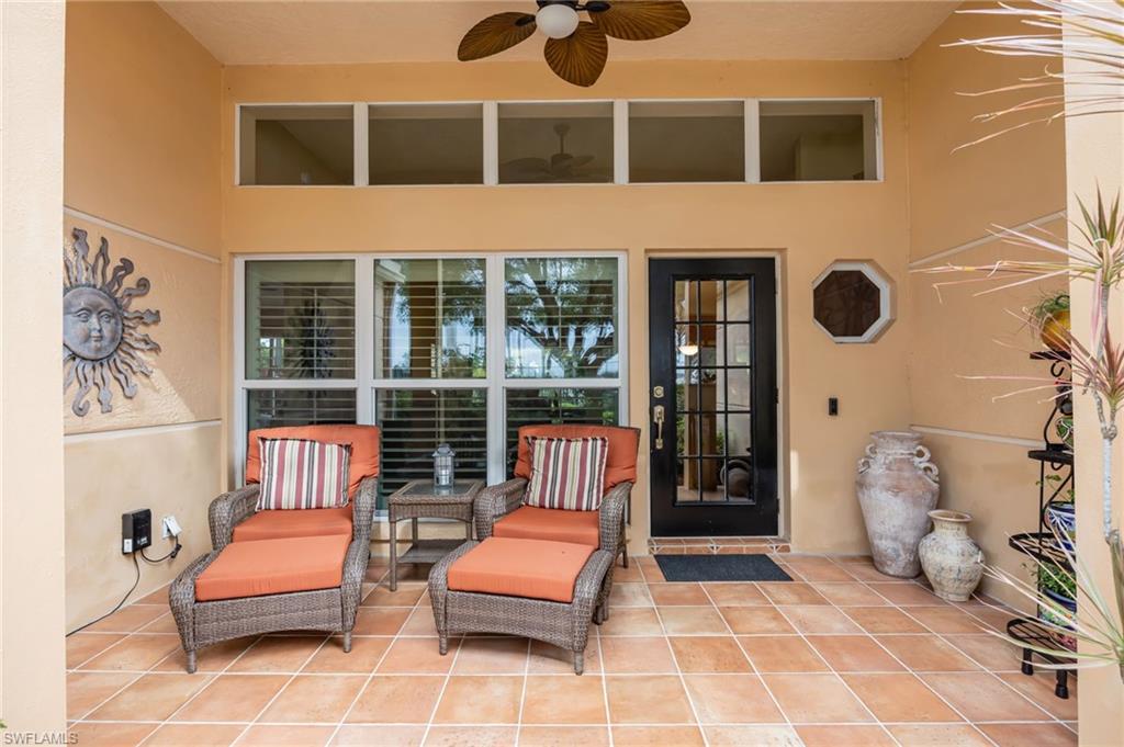 View of front patio with a ceiling fan