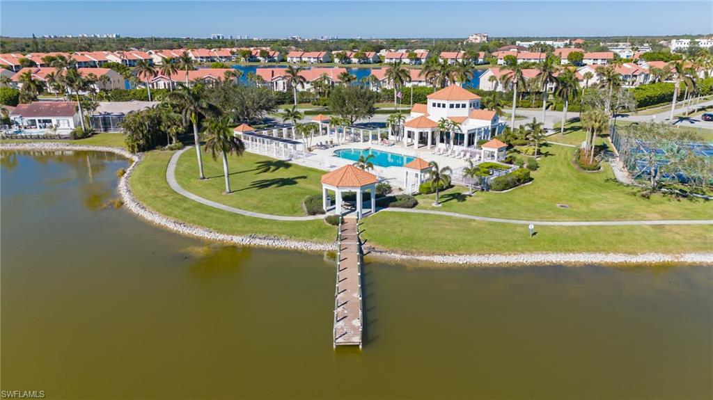 Aerial perspective of a large body of water and a pool area