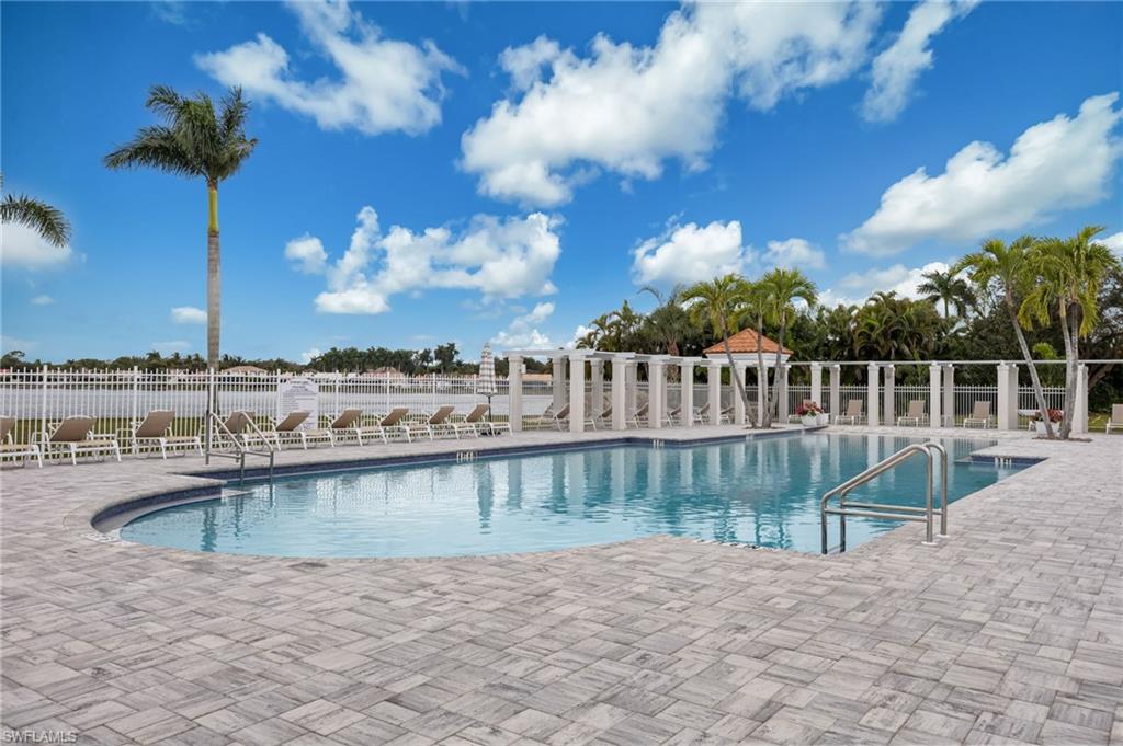 Community pool featuring a patio area
