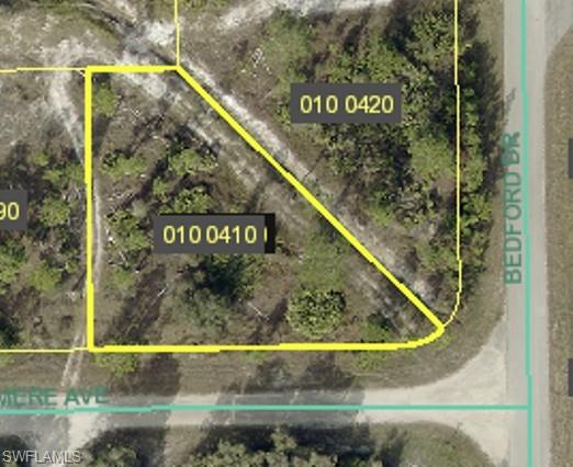 Aerial overview of property's location with property parcel outlined