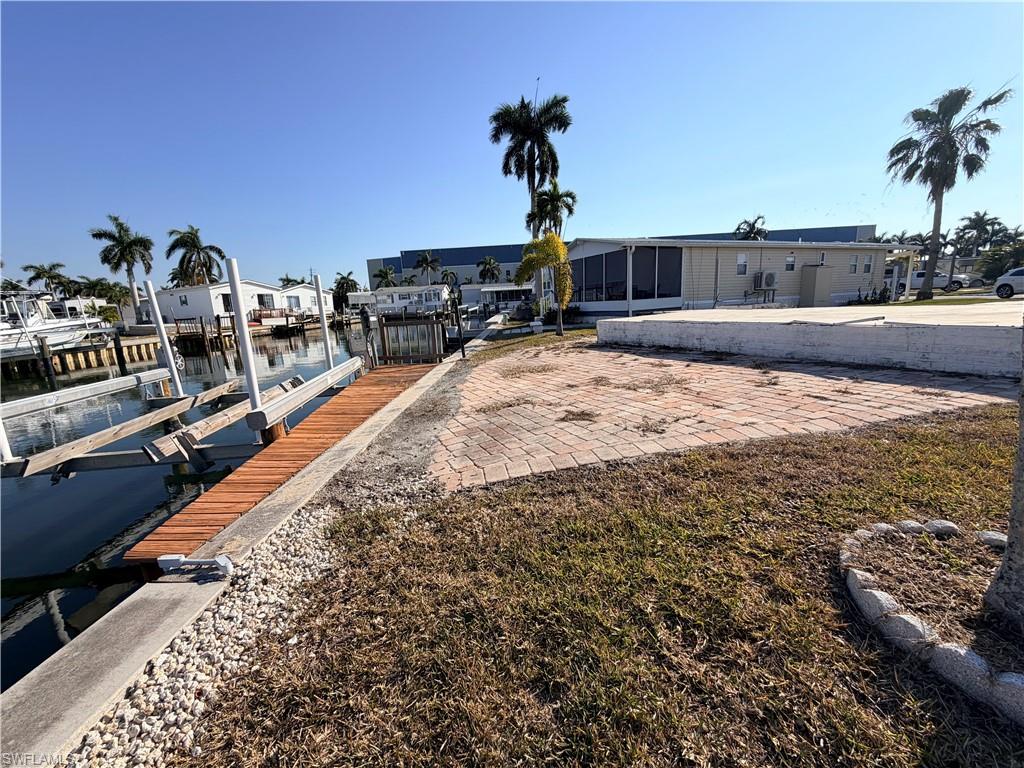 Dock with boat lift and seawall