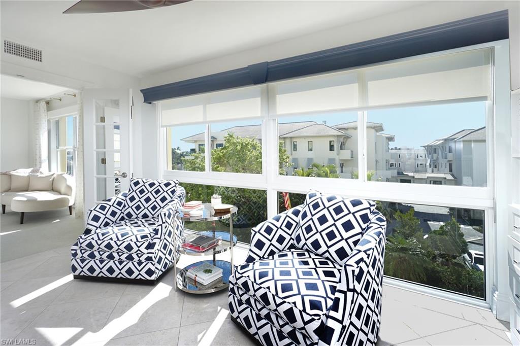 Sunroom with tile patterned flooring