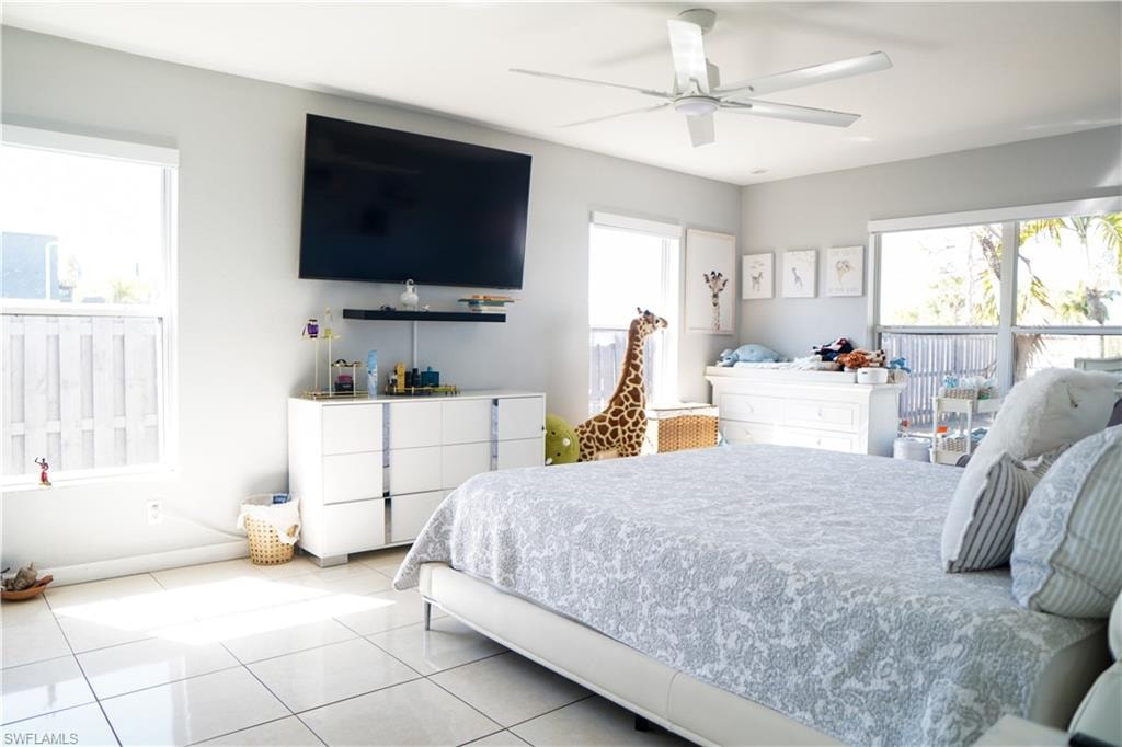 Bedroom featuring ceiling fan and light tile patterned floors