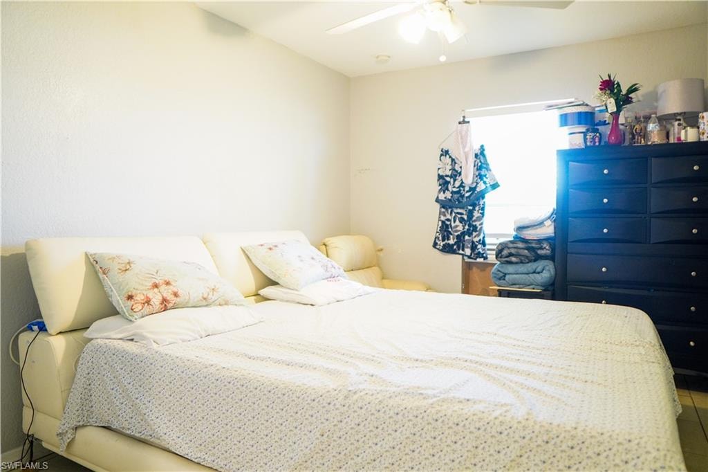 Bedroom featuring a ceiling fan