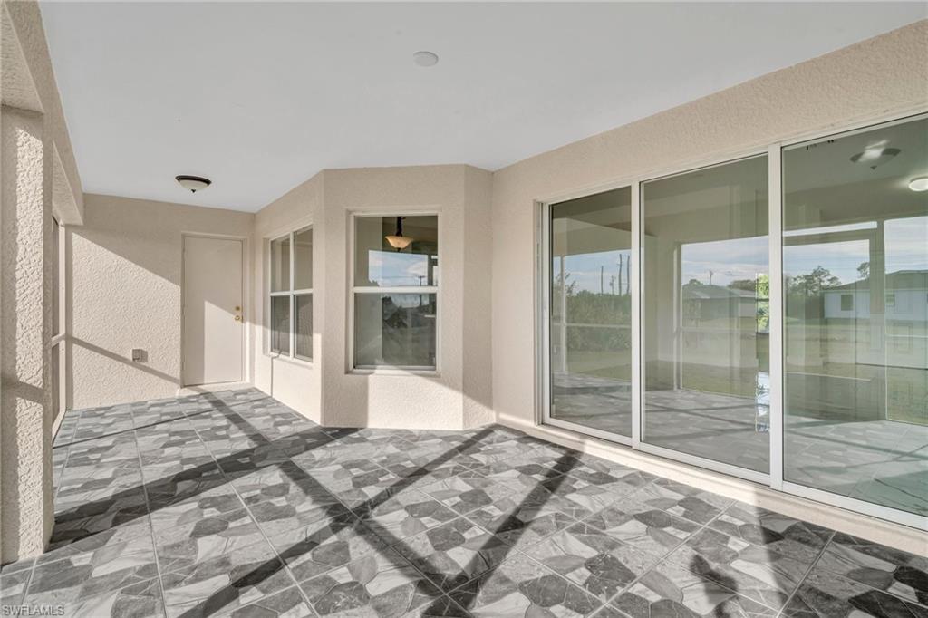 View of patio / terrace with a sunroom