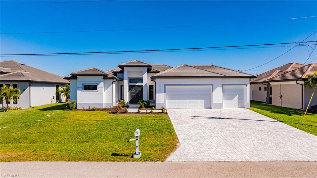 Prairie-style house with a front lawn, stucco siding, an attached garage, a tile roof, and driveway