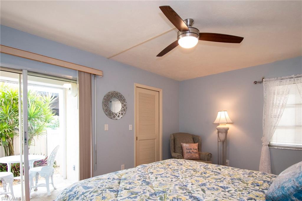 Bedroom featuring access to outside, a closet, and ceiling fan