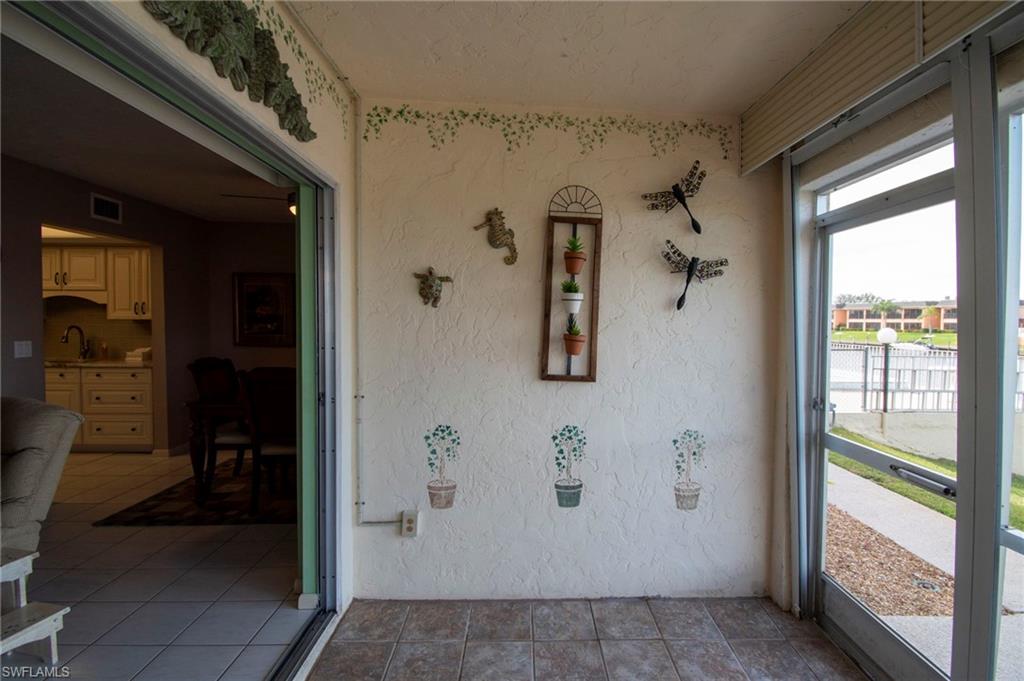 Unfurnished sunroom with a sink