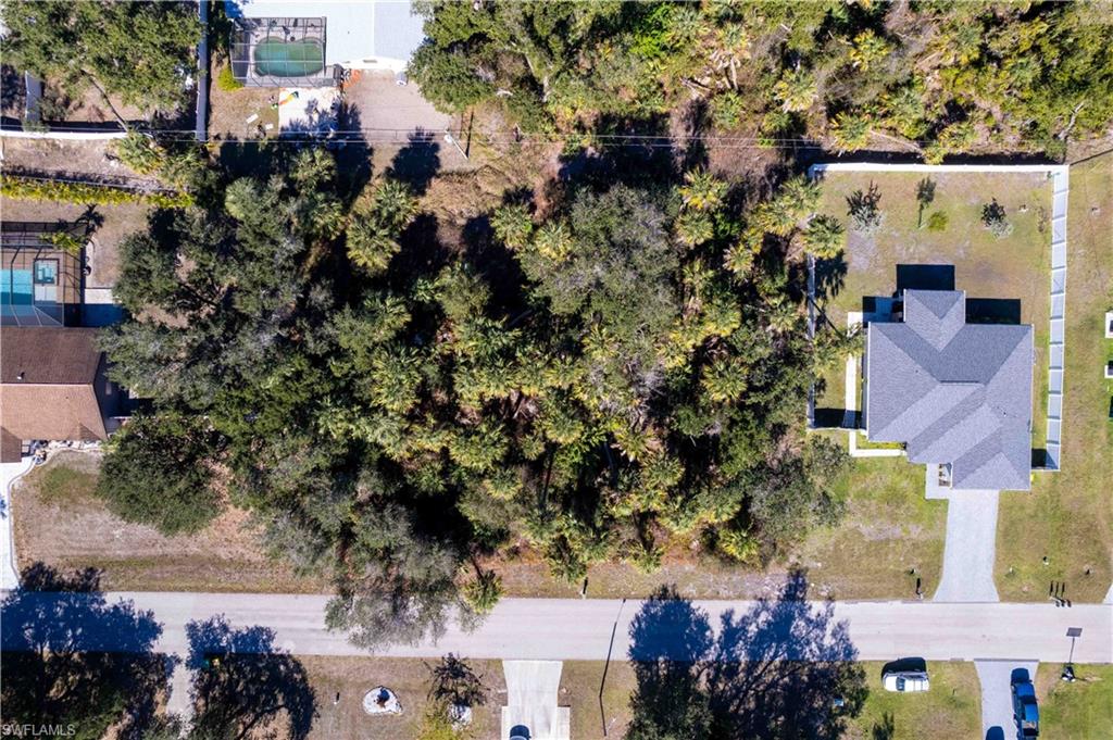 Perfectly situated for BUILDING A CUSTOM HOME, this VERY SPACIOUS PROPERTY measures 125 feet by 160 feet, providing a generous 20,000 sq ft OF LAND TO BRING YOUR VISION TO LIFE!