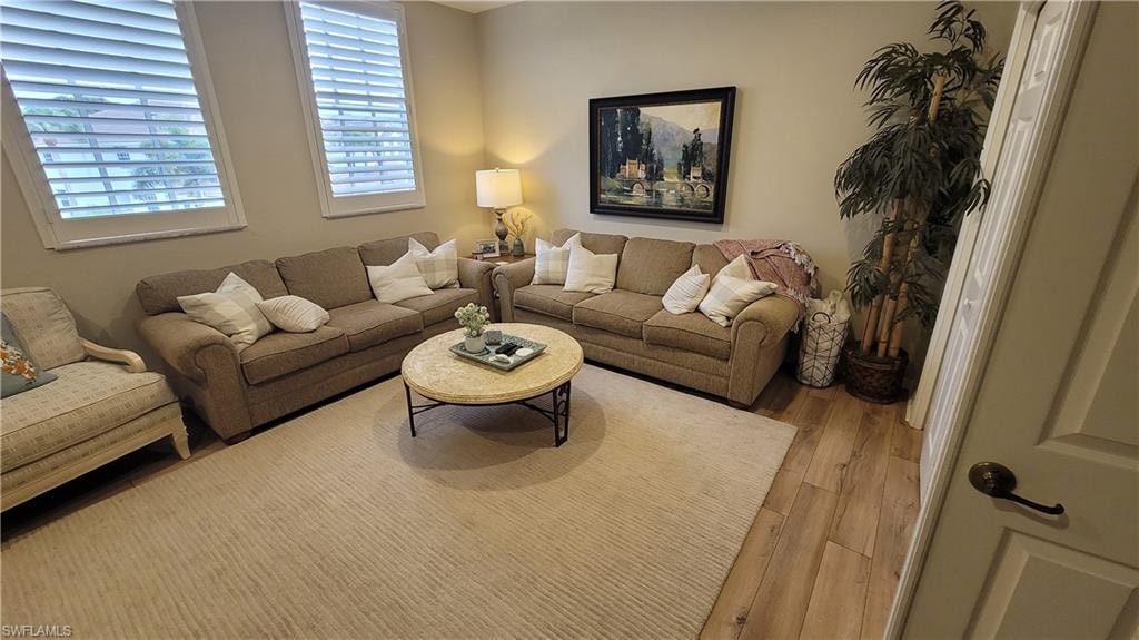 Living area with wood finished floors