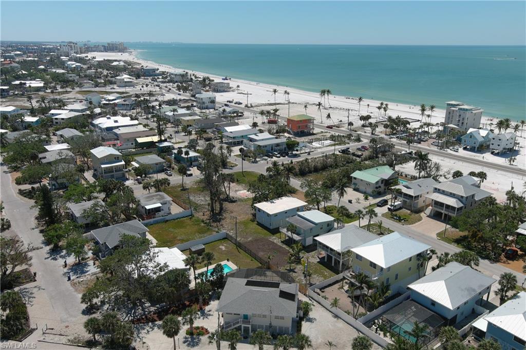 Aerial view with a view of the beach and a water view