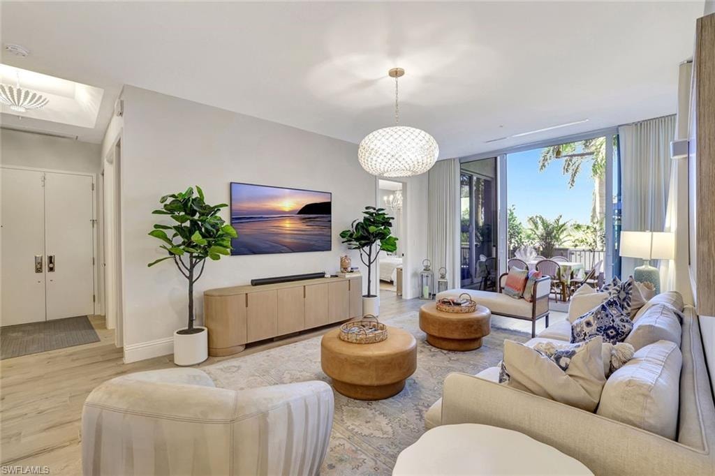 Living area featuring wood finished floors and expansive sliding doors