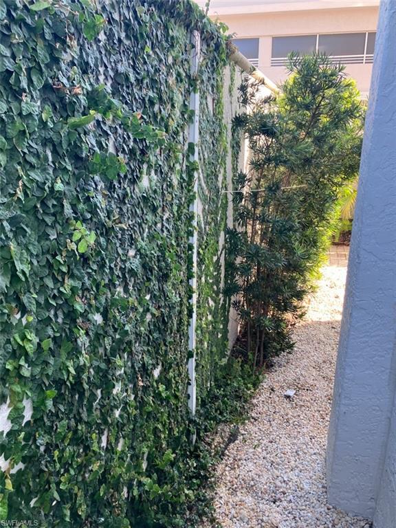Lush landscaped view of private patio