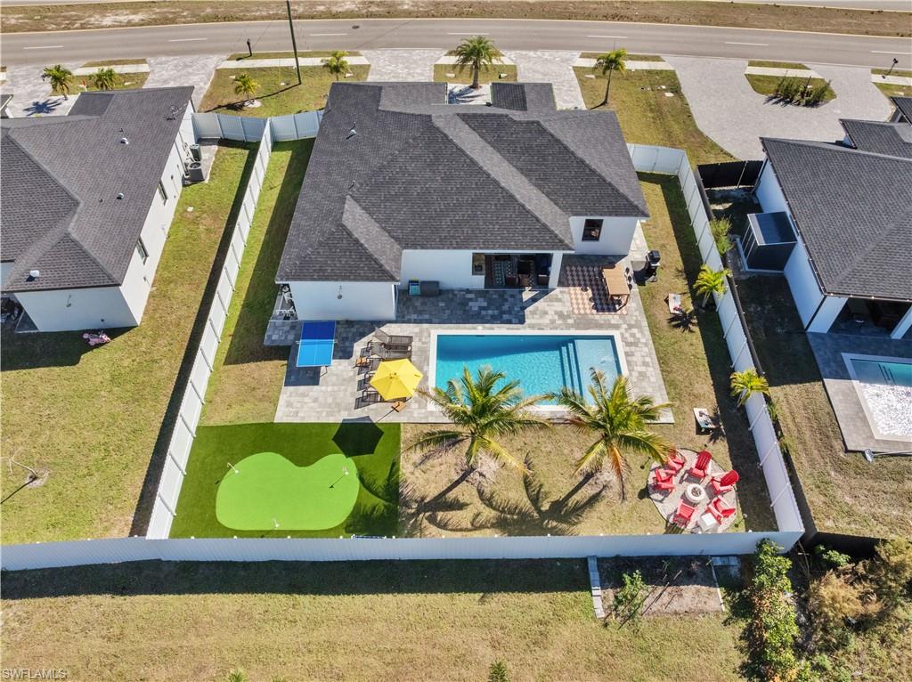 View from above of property with a pool area