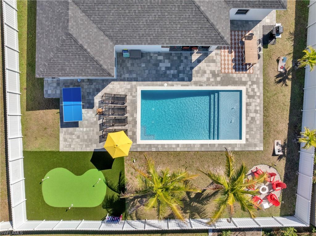 View from above of property with a pool