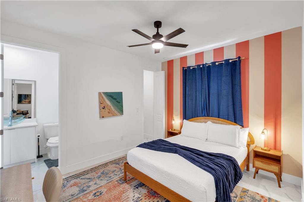 Bedroom featuring ceiling fan and light tile patterned flooring