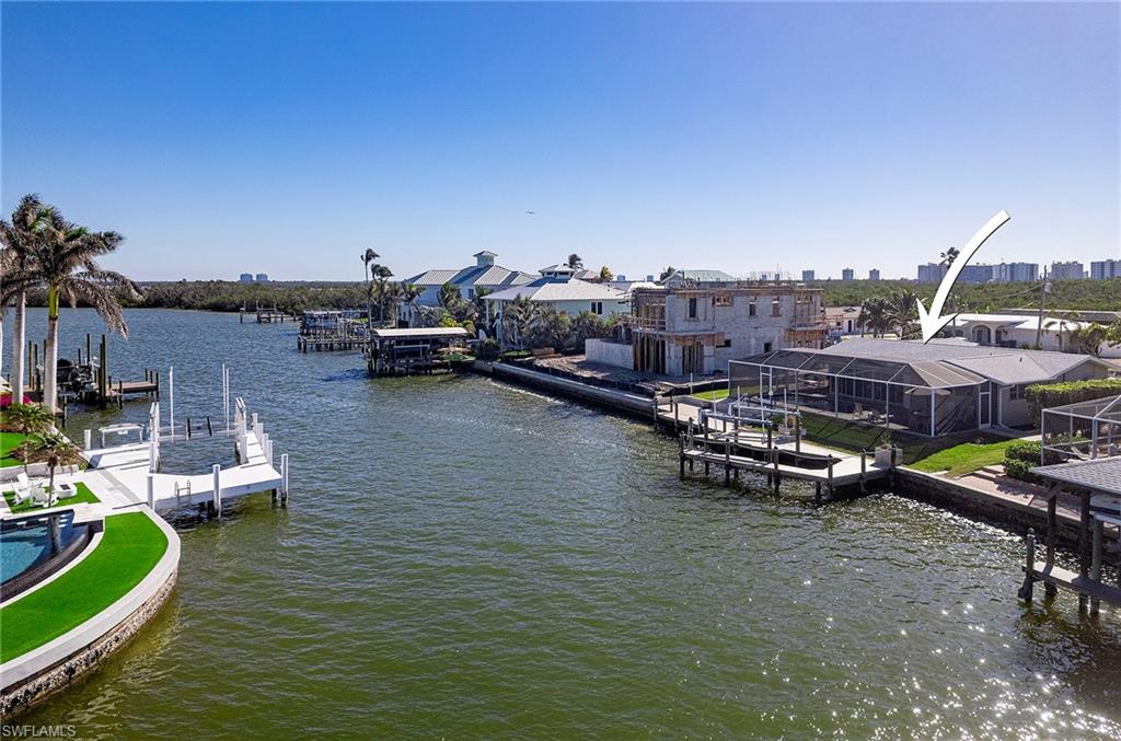 Dock area featuring a water view
