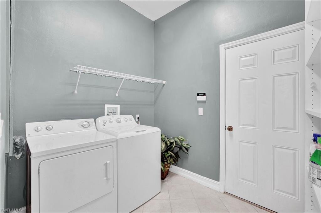 Painted accent wall in separate laundry room