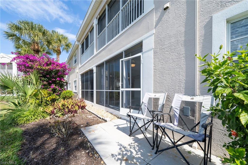 View of patio / terrace with a sunroom