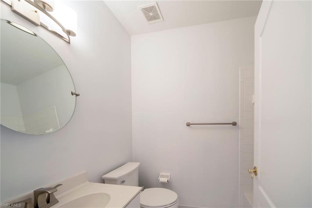 Full bathroom with vanity and shower / washtub combination